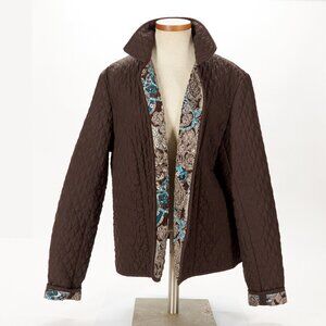 Beautiful quilted brown jacket with fun pops of color on the inside.
